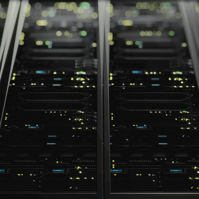 Rows of illuminated data centre servers representing the growing energy demand and shift towards on-site solar power solutions.