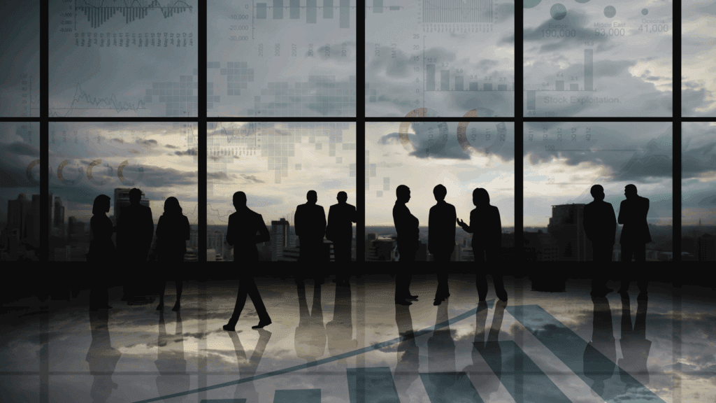 ChatGPT said: Here’s SEO-friendly metadata for your image: Alt Text: Silhouettes of business professionals discussing data and analytics in front of a city skyline