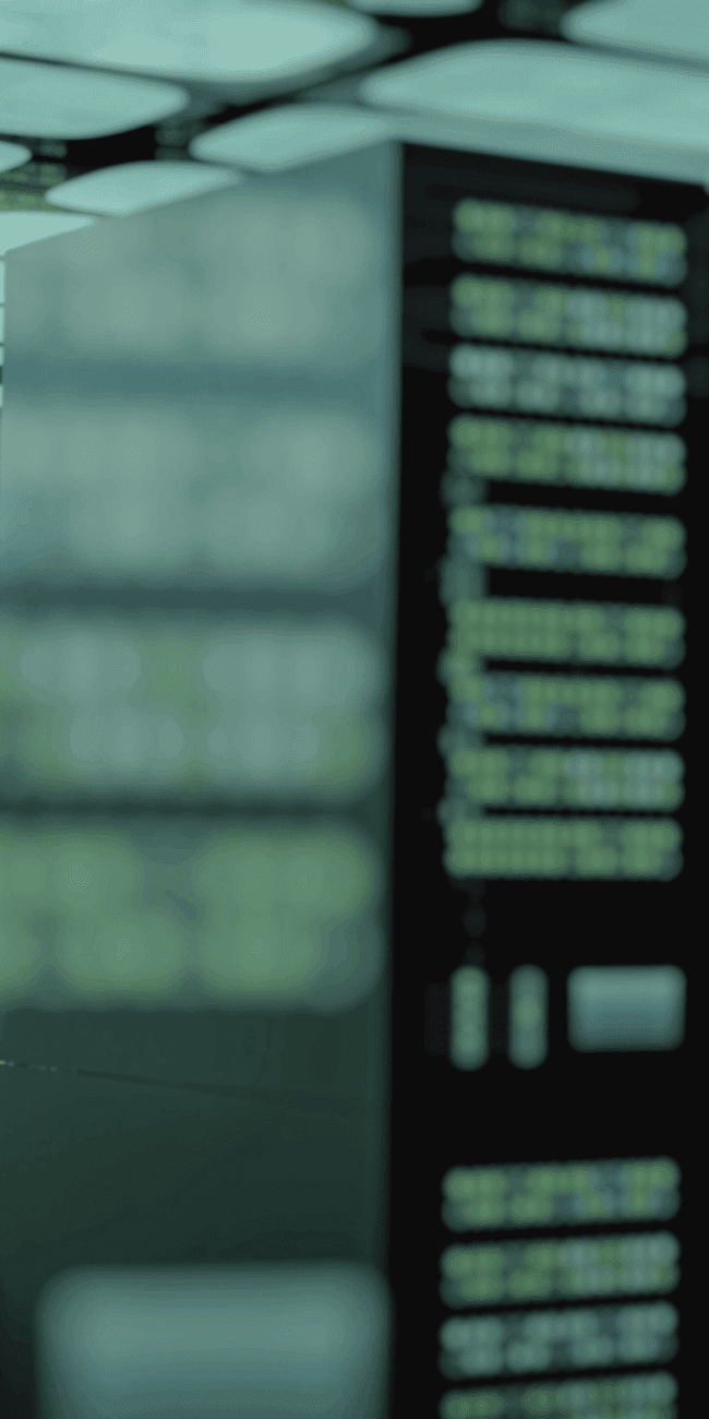 Modern data centre server racks with digital displays and green system indicators