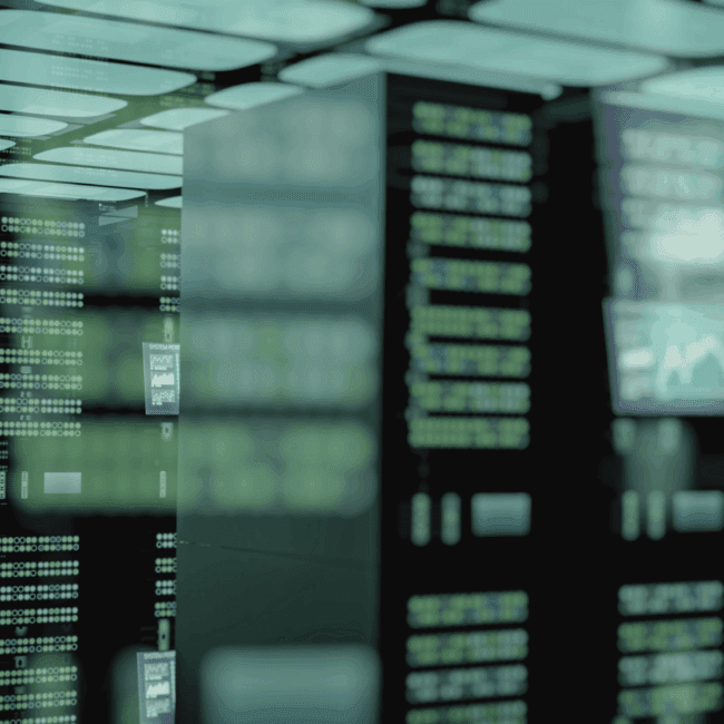 Modern data centre server racks with digital displays and green system indicators
