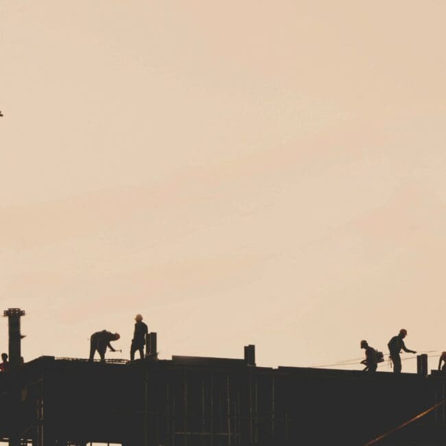 Data centre construction professionals working on a mission-critical infrastructure project, reflecting talent demand across the US and Europe