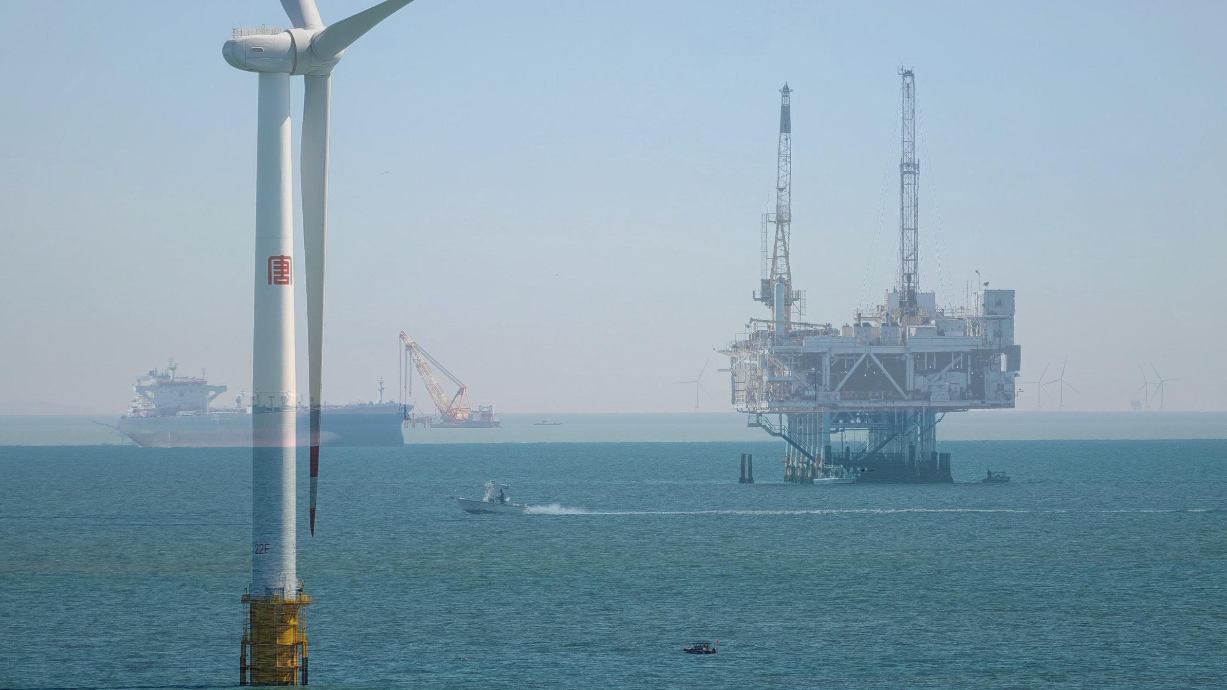 Offshore wind turbine, offshore platform and installation vessels supporting renewable energy infrastructure in the North Sea.